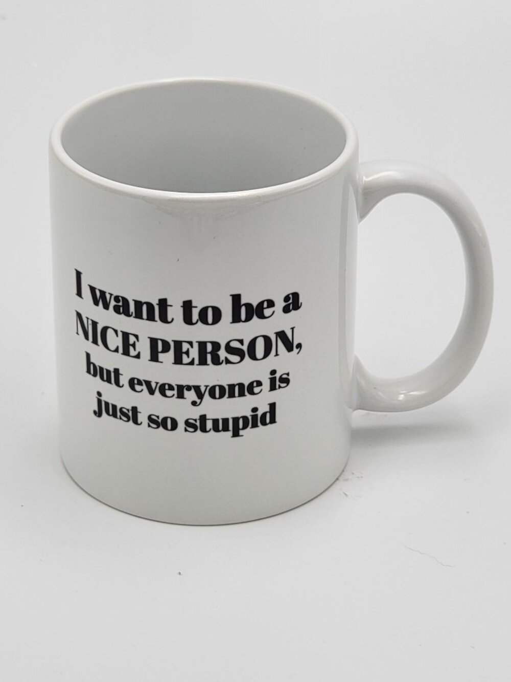 White Ceramic Mug With Black Text - "I Want To Be A Nice Person But Everyone Is